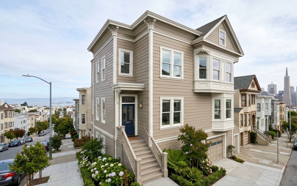 San Francisco home with new siding installed by Best Exteriors, showing a multi-story property with clean fiber cement panels and detailed trim. This siding replacement project reflects typical Bay Area architecture with bay windows and a hillside setting. The updated exterior helps protect against coastal weather while improving curb appeal and insulation. Best Exteriors provides full-home siding replacement across Northern California, with offices in Oakland and Sacramento, serving homeowners searching for siding replacement San Francisco CA.