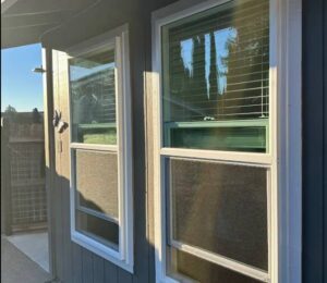 Double slider window installation and replacement on a Sacramento, CA home featuring energy-efficient white vinyl windows.